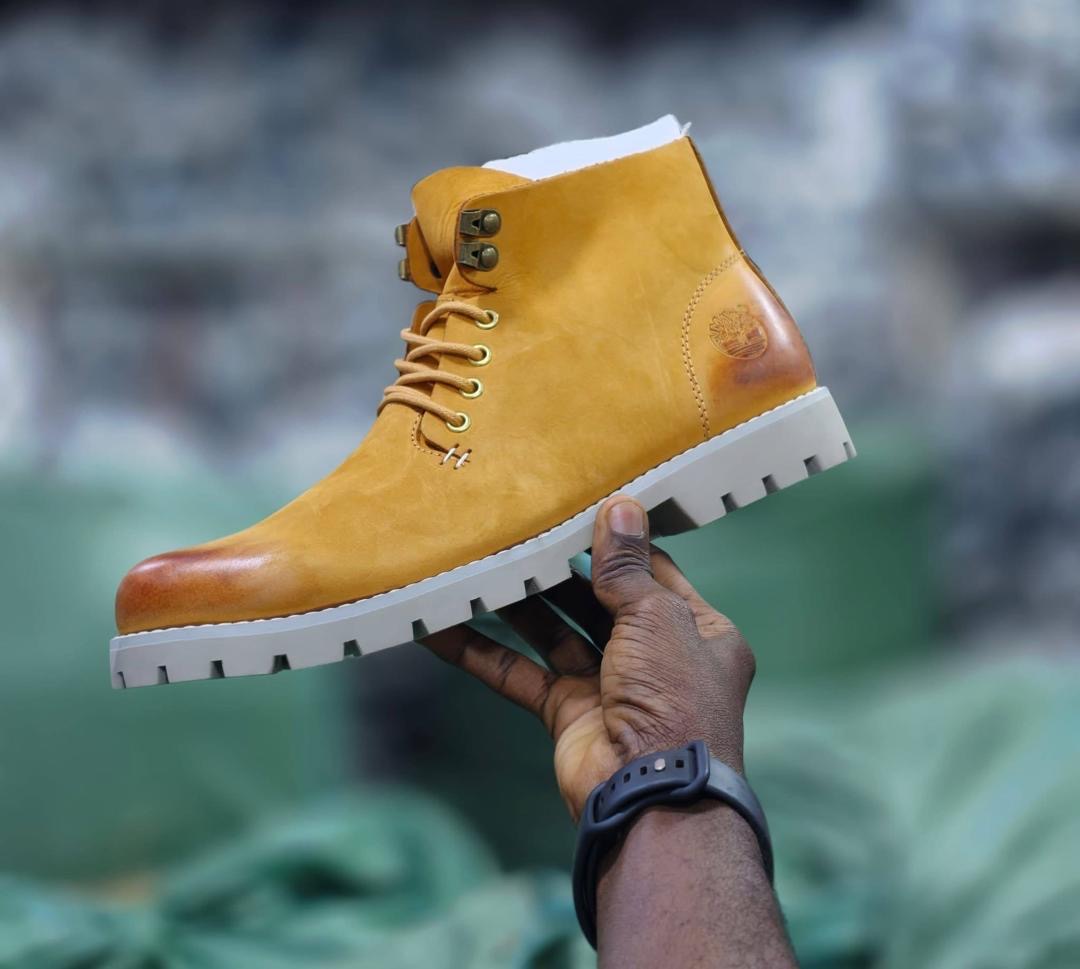 Men's rugged ankle boots / casual outdoor boots.
Features multiple variations including classic lace-up work boot cuts, cap-toe details, and brogue-inspired wingtip perforations.
Thick lugged rubber outsoles designed for enhanced traction and durability.